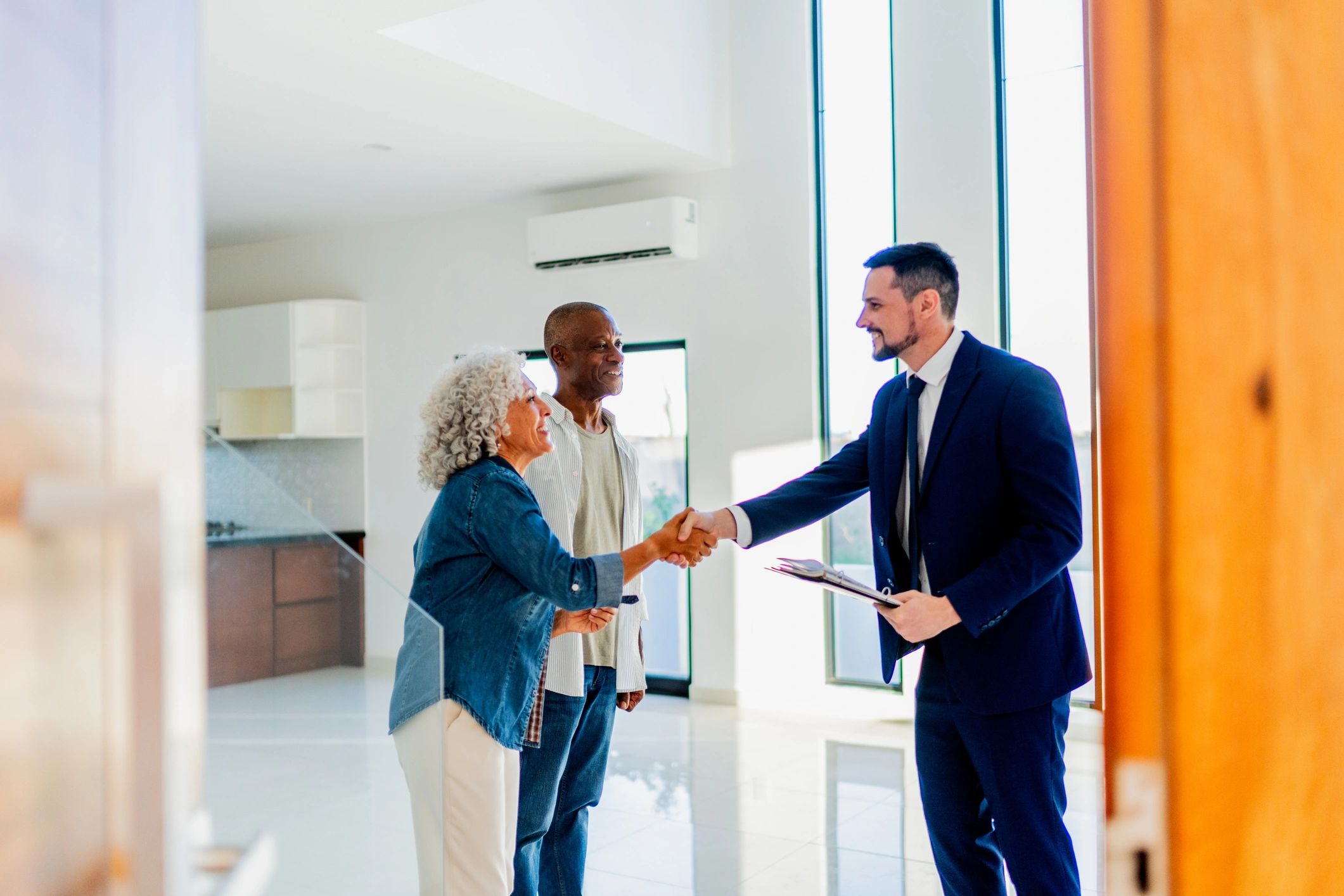 Property professional meeting with prospective tenants
